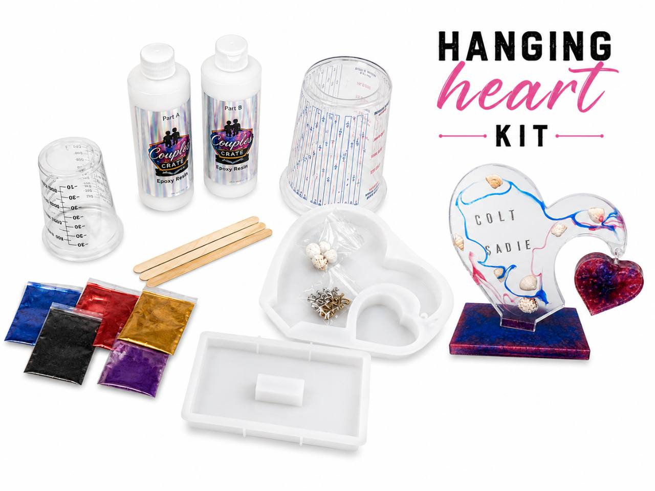 Hanging Heart Kit contents: resin, pigments, heart molds, letters, shells, and mixing tools